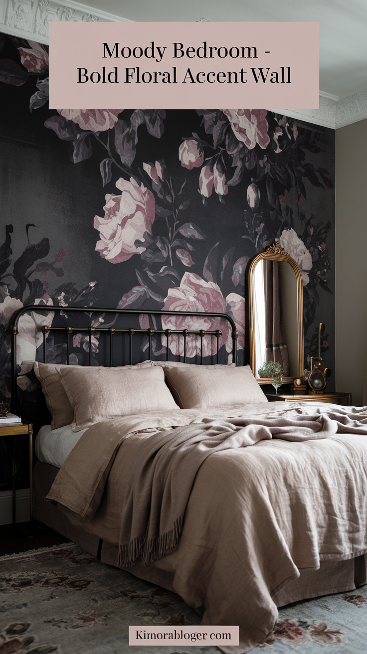 A bold floral mural behind the bed—charcoal background with muted rose blooms. Soft beige bedding and a gold-framed mirror add vintage charm.