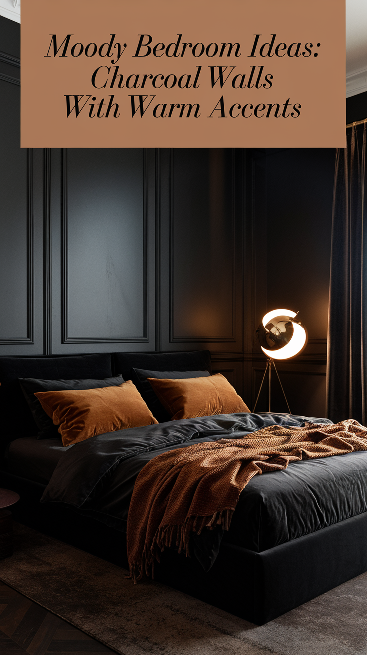 A moody charcoal room with a matte black bed frame, caramel velvet pillows, and a brass floor lamp glowing softly in the corner.